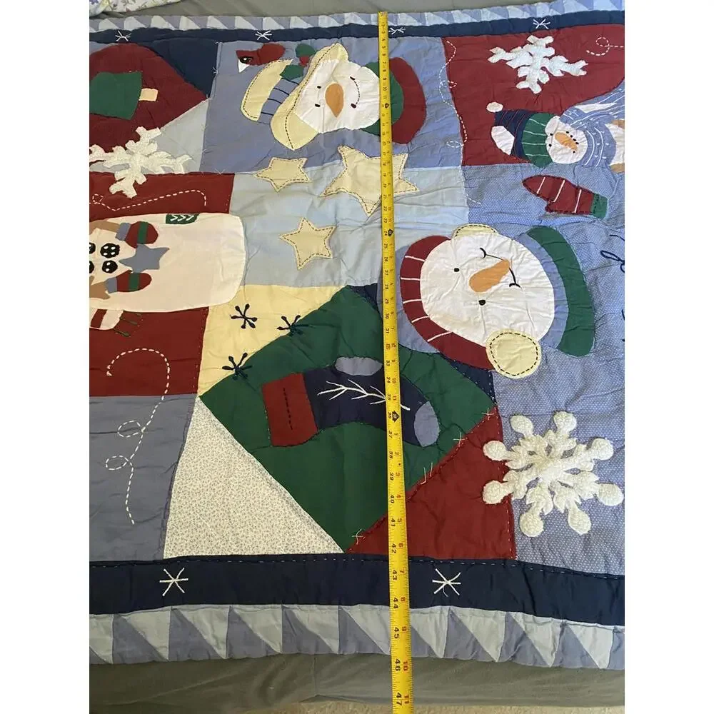 Winter Themed Patchwork Quilt with Snowman Design
